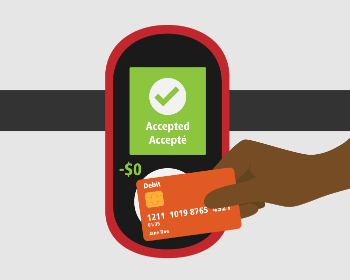 A hand tapping the debit card on a fare reader.