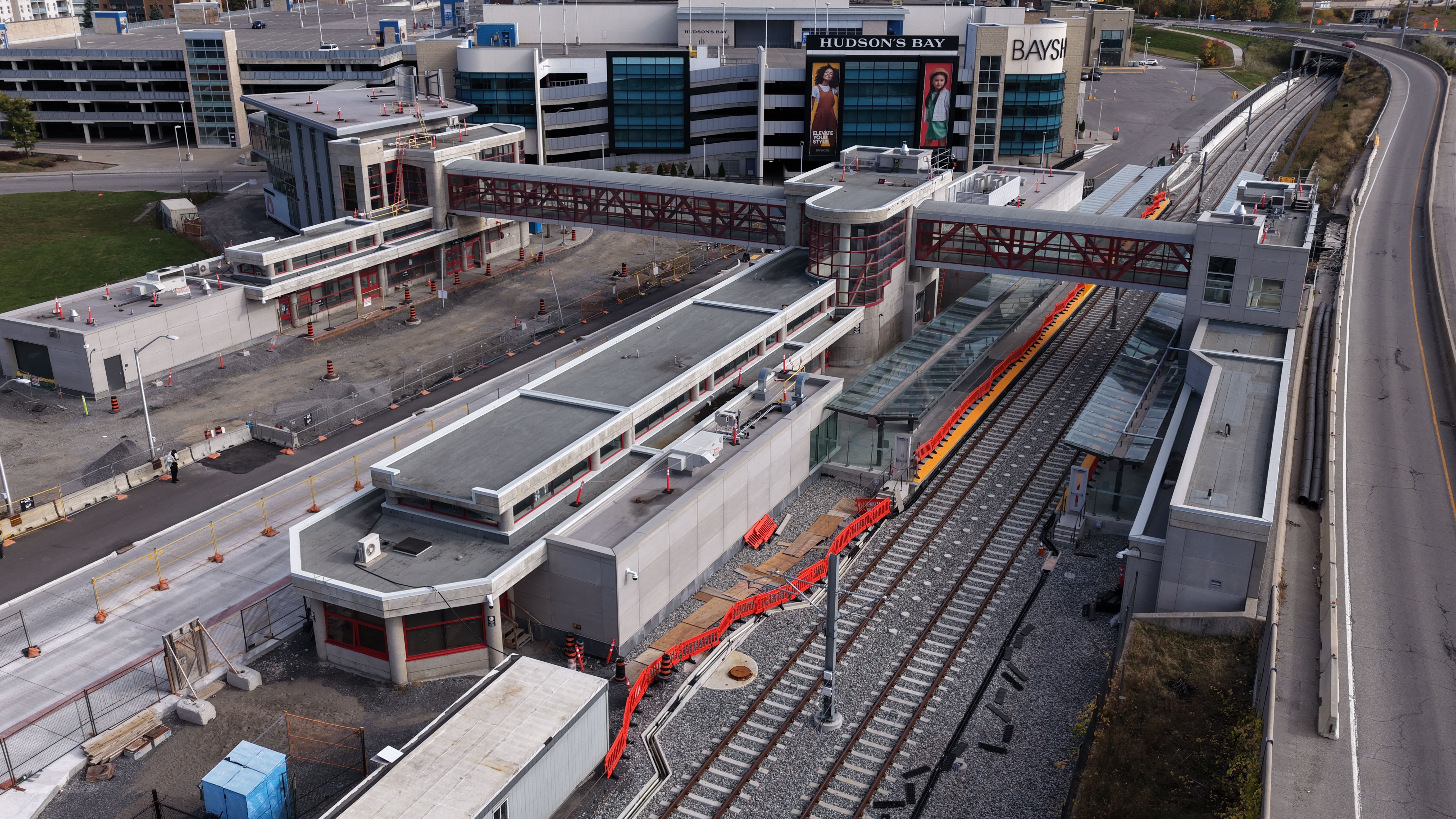 Elevator and pedestrian overpass structures are nearly ready for final finishes at Bayshore Station, crucial for accessibility and safe crossing of the rail corridor.